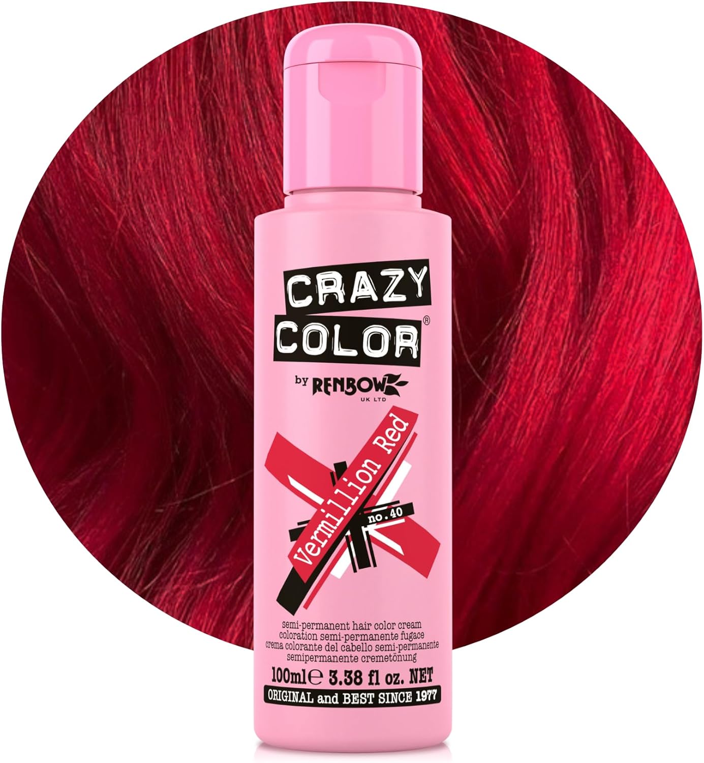 Crazy Color Vibrant Vermillion Red semi-permanent hair dye bottle in front of bright scarlet red hair