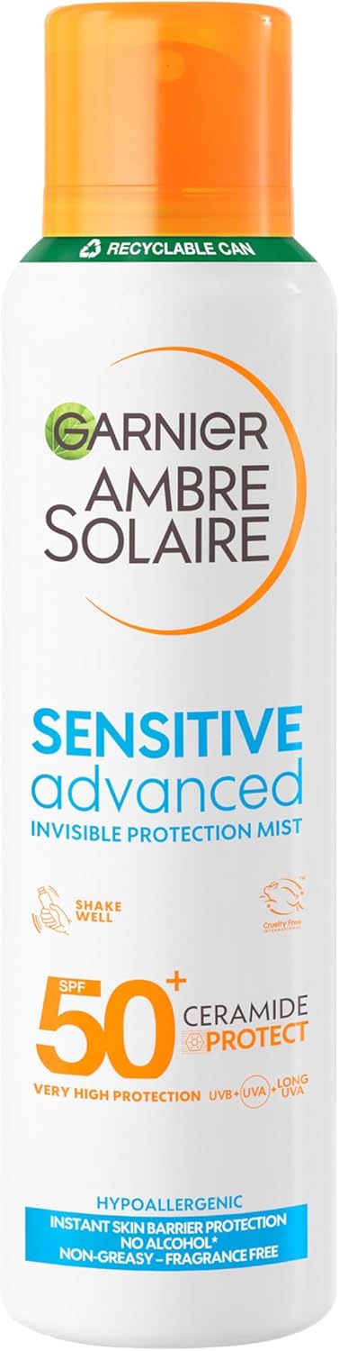 Garnier Ambre Solaire SPF 50+ Sensitive Advanced Dry Mist 150ml spray can on a sunny background