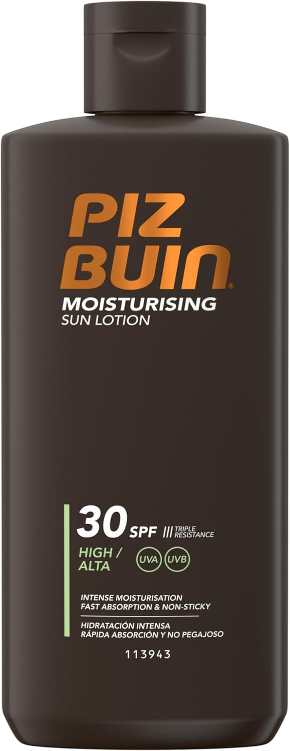 Piz Buin Moisturising Sun Lotion SPF 30 200ml bottle on a sunlit beach towel