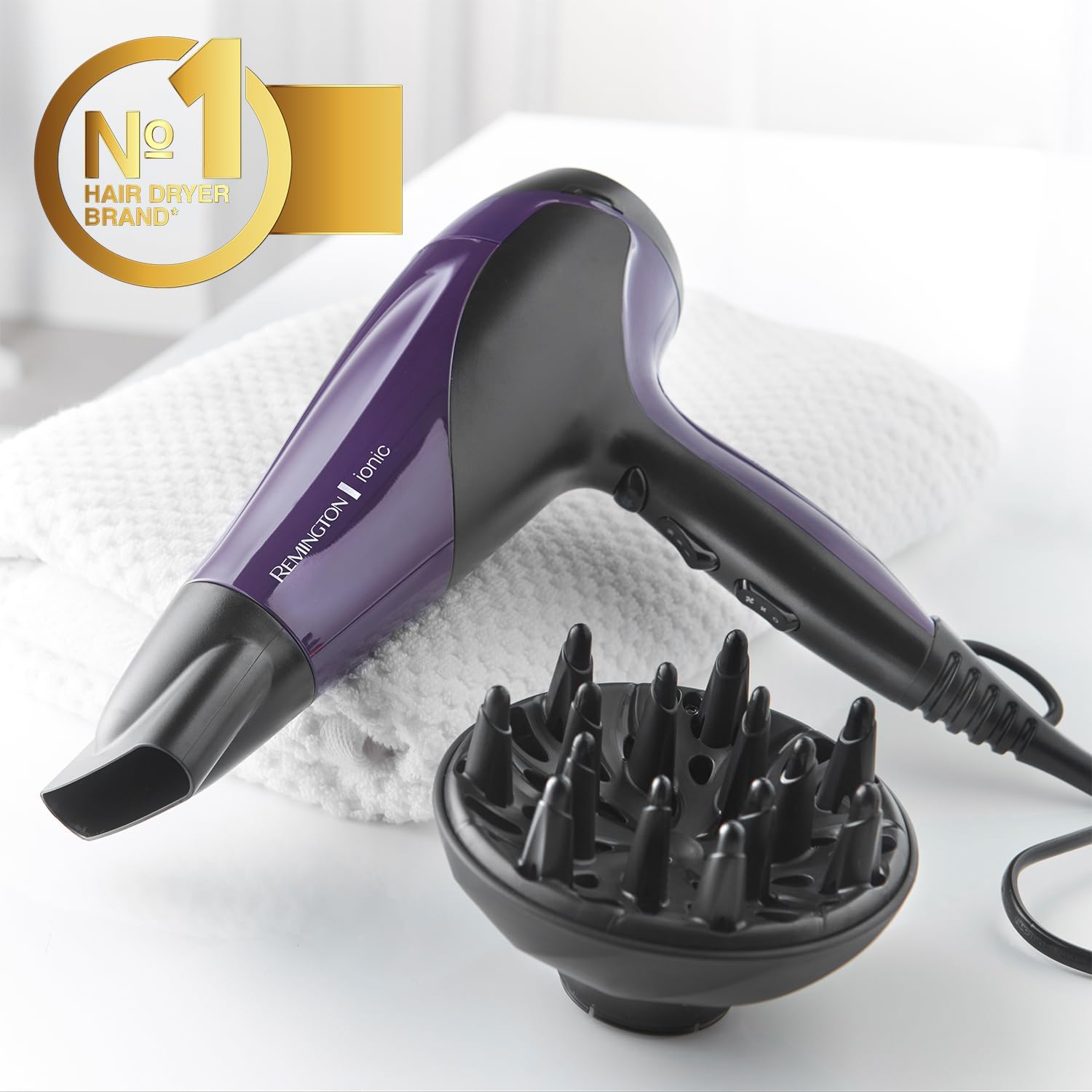 Remington D3190 hair dryer on a towel with the number one brand badge
