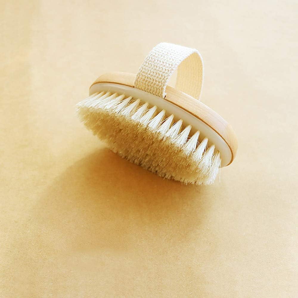 Close-up of the Ithyes body brush showing the density and length of its natural boar bristles