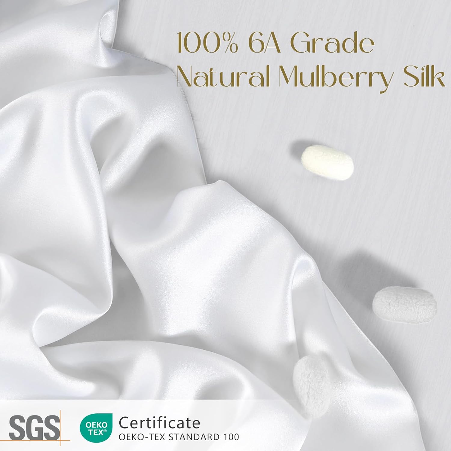 Close-up of draped white 6A grade mulberry silk fabric beside silk cocoons