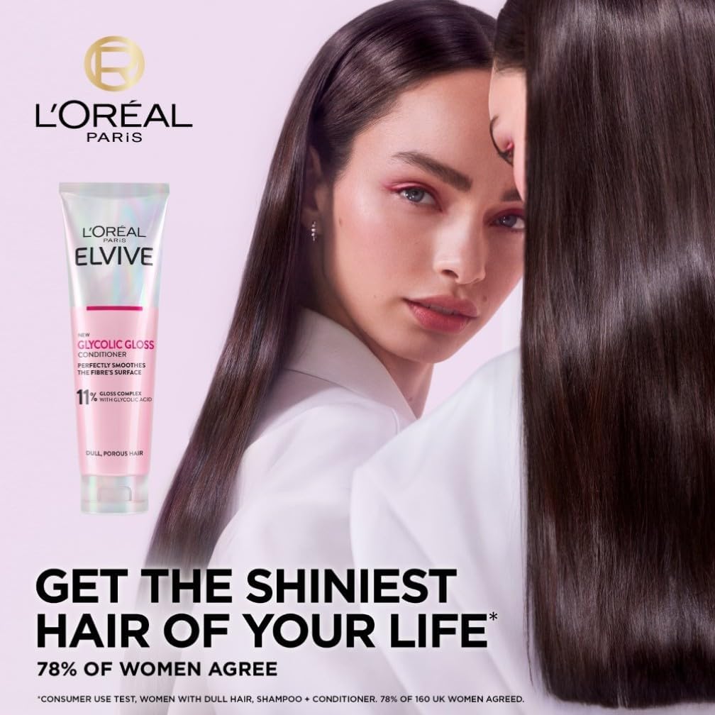 Model with long shiny dark brown hair next to L'Oreal Elvive Glycolic Gloss Conditioner bottle