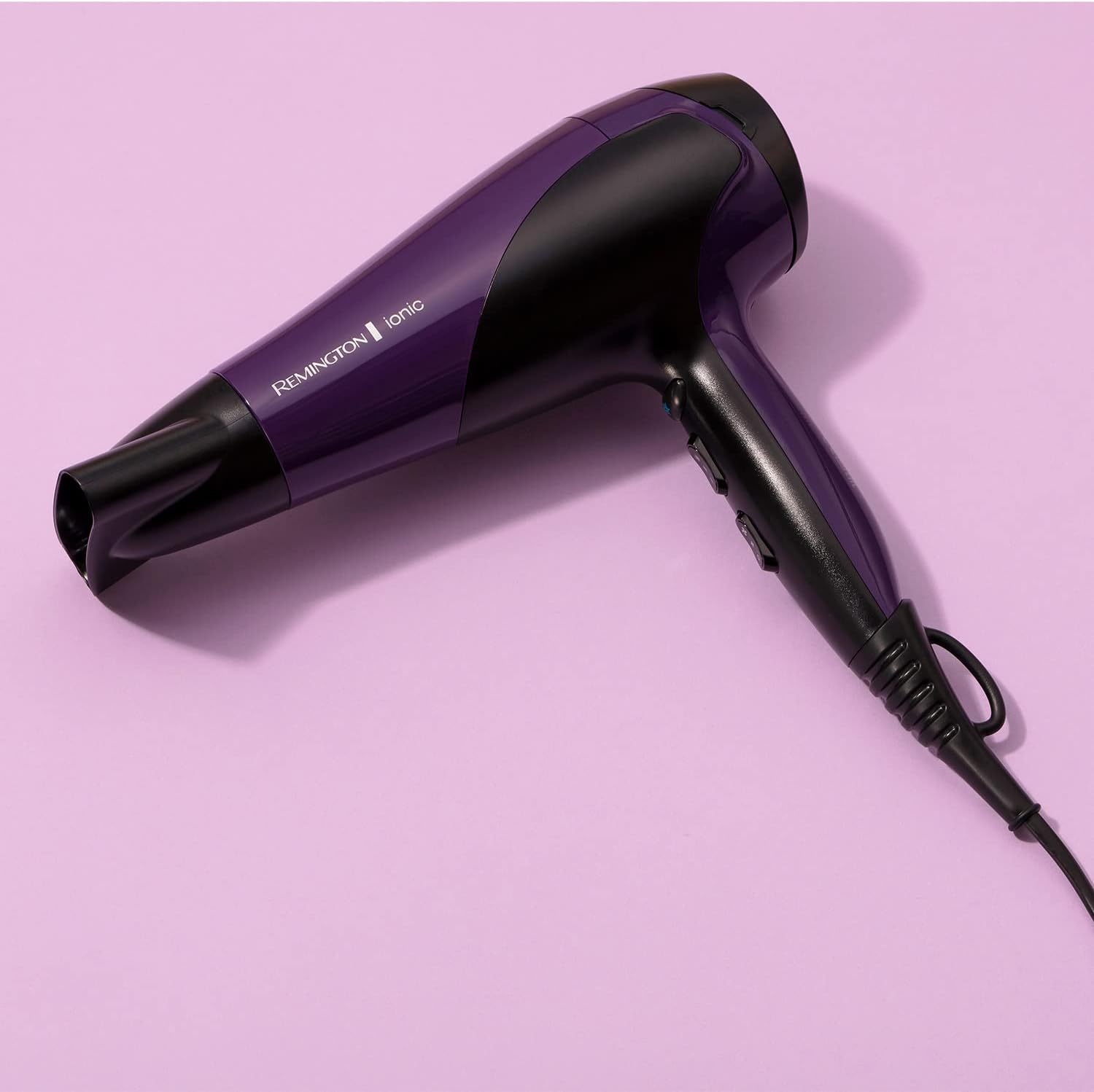 Close-up of the Remington D3190 hair dryer body with heat and speed controls