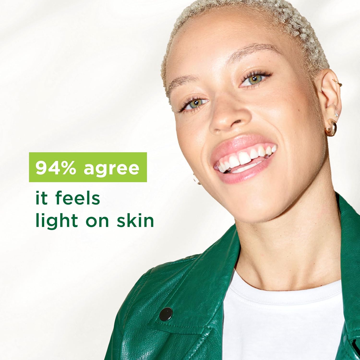 Smiling woman next to Simple's claim that 94% of users agree the moisturiser feels light on skin