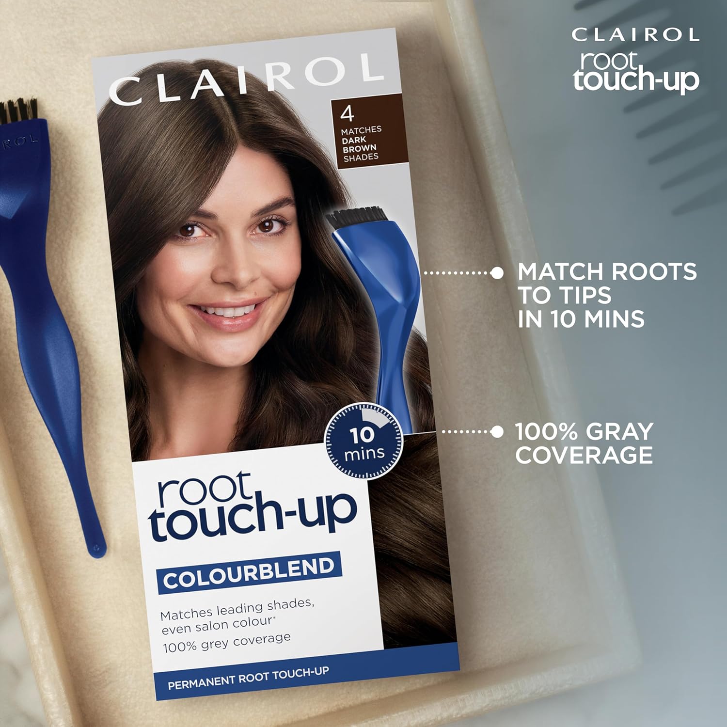 Clairol Root Touch-Up components laid out in context with gloves and developer