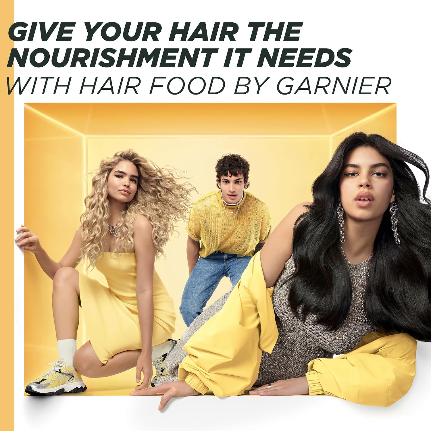 Three models with curly, wavy and straight hair in a Garnier Hair Food campaign image