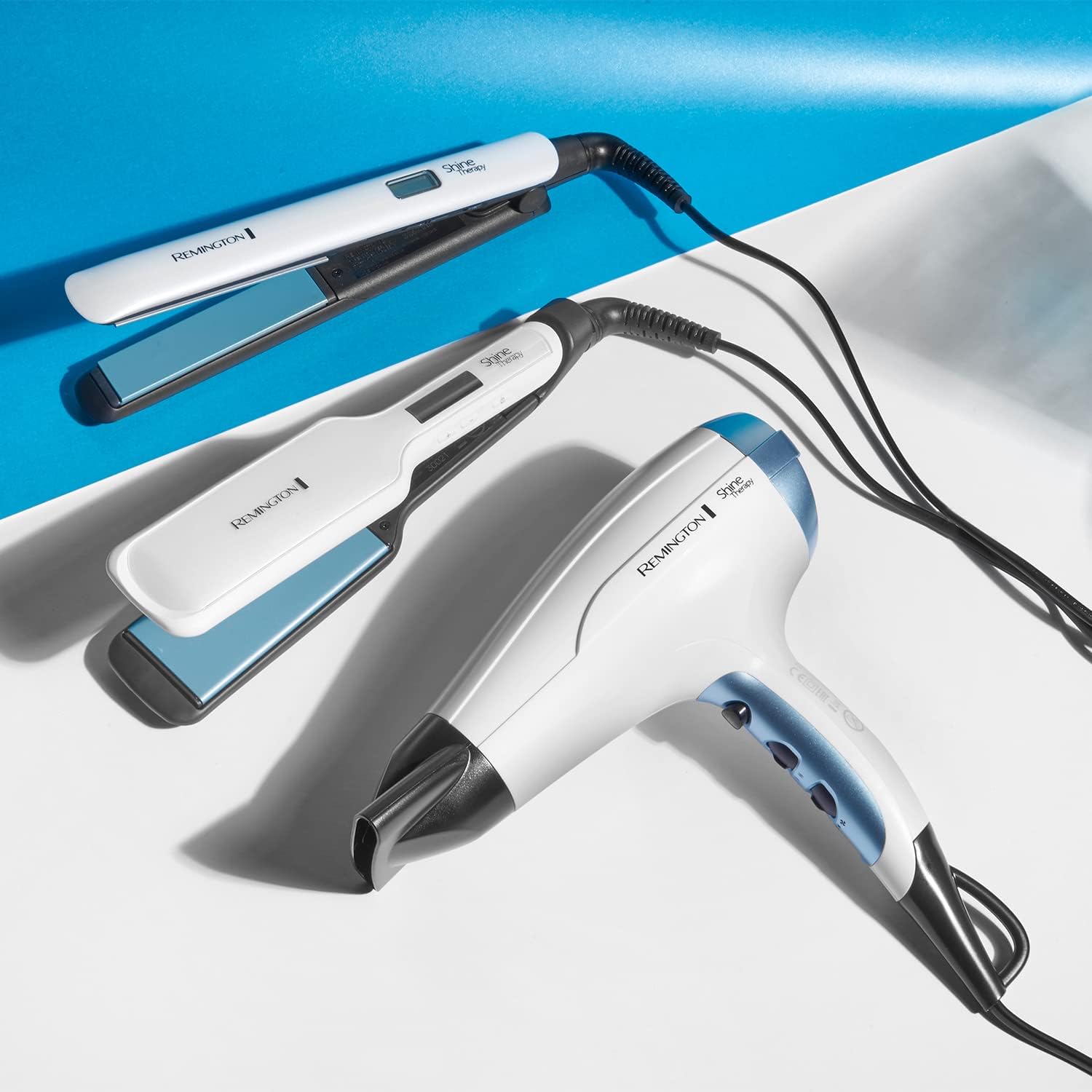 Remington Shine Therapy straightener in a styling setting on a dressing table