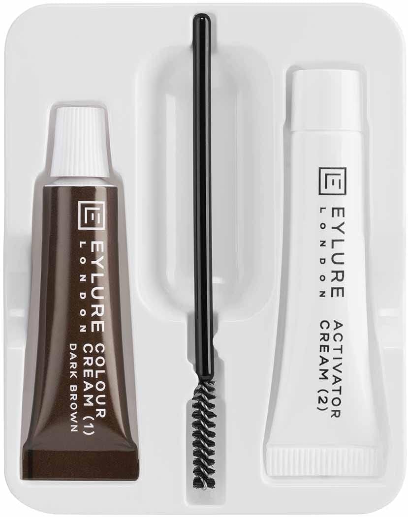 Eylure DYBROW kit contents laid out including dye cream, activator, mixing dish and applicator