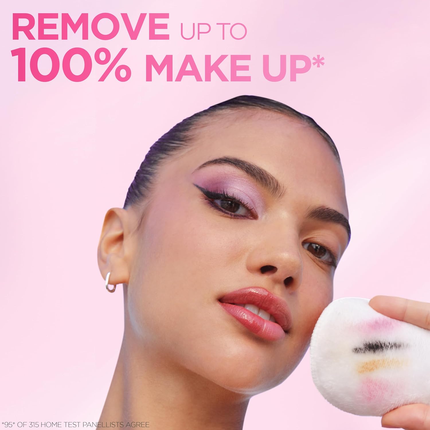 Garnier Micellar Water demonstration showing effective makeup removal from face with a single cotton pad wipe