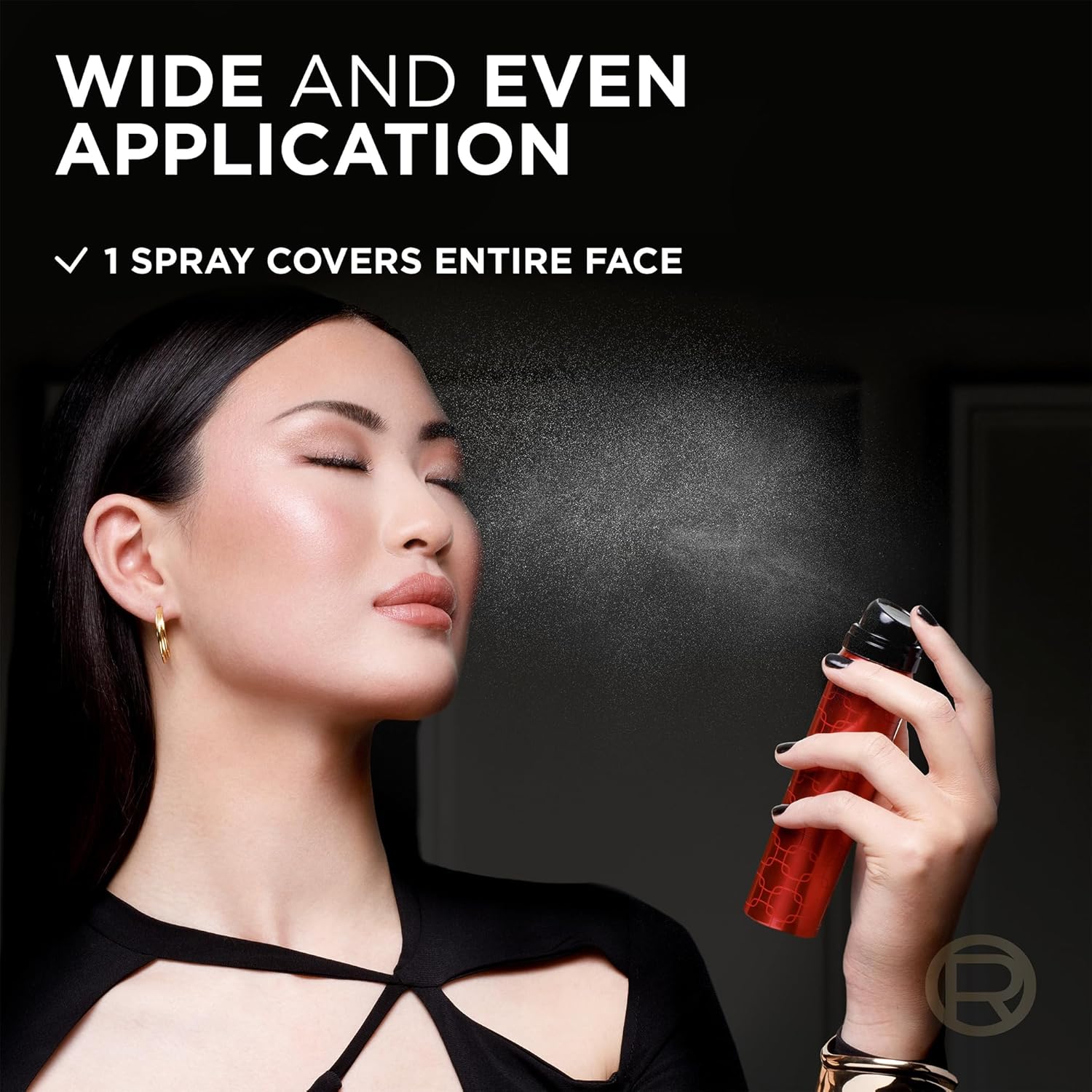 Model demonstrating proper application technique for L'Oreal Paris Infallible Setting Spray held at arm's length from face