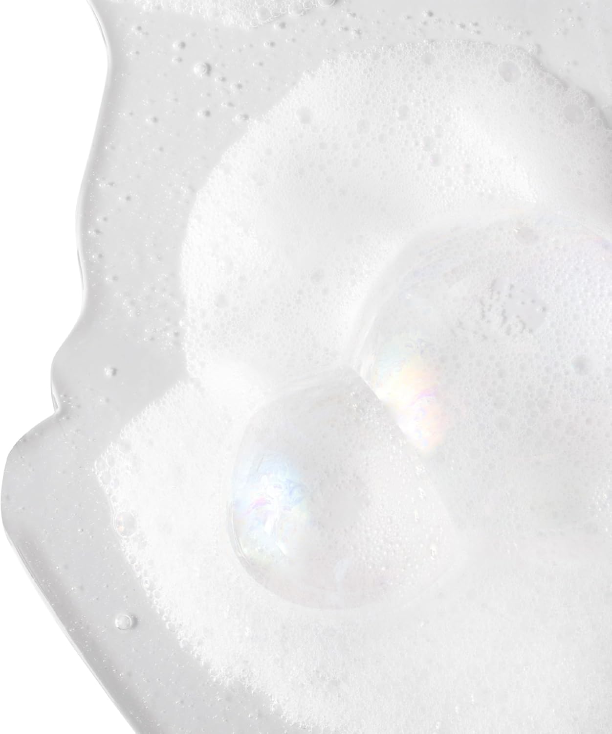 Close-up of CeraVe Foaming Cleanser foam texture showing light airy lather with bubbles