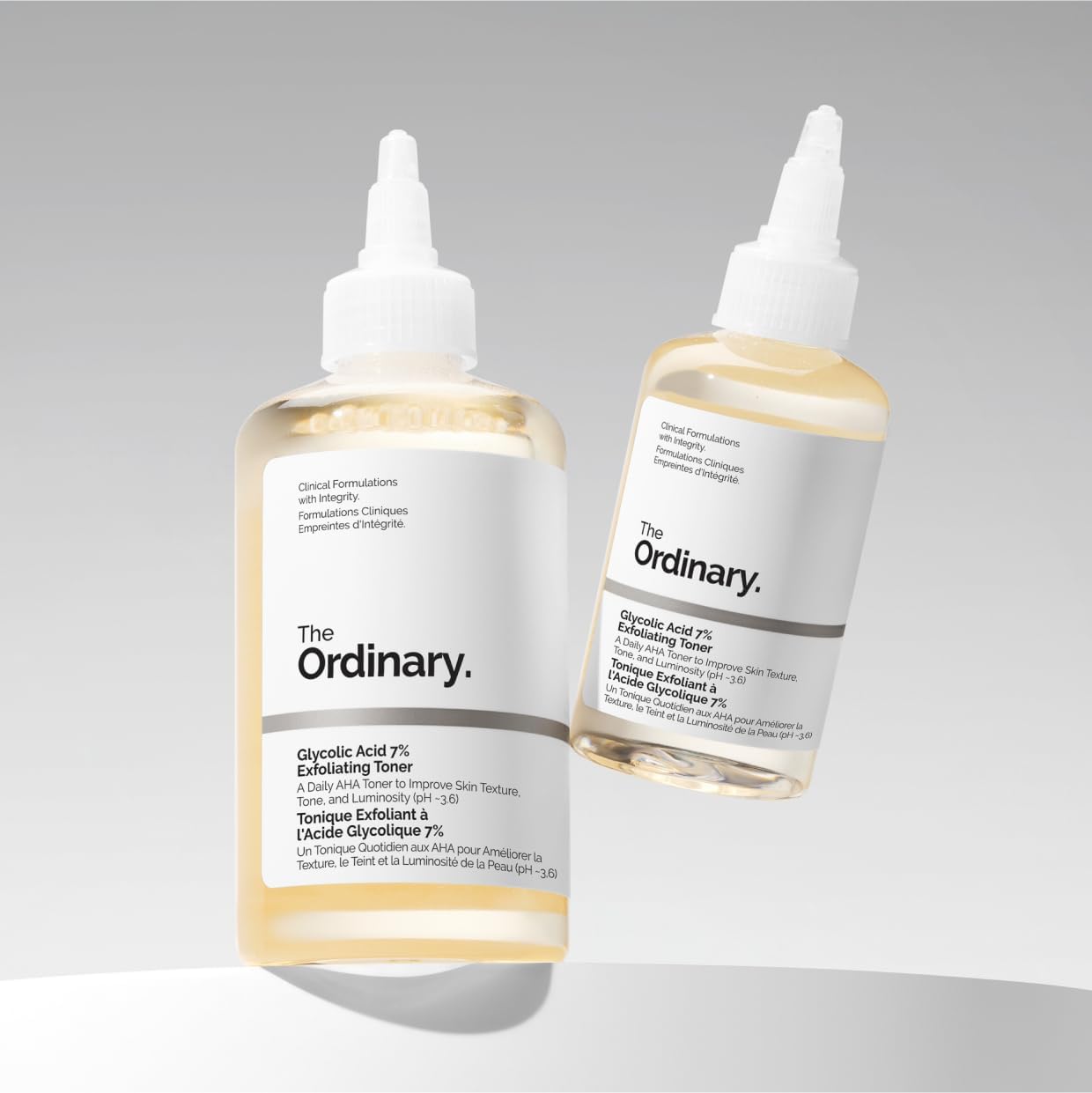 Both sizes of The Ordinary Glycolic Acid 7% Exfoliating Toner - 240ml and 100ml bottles side by side