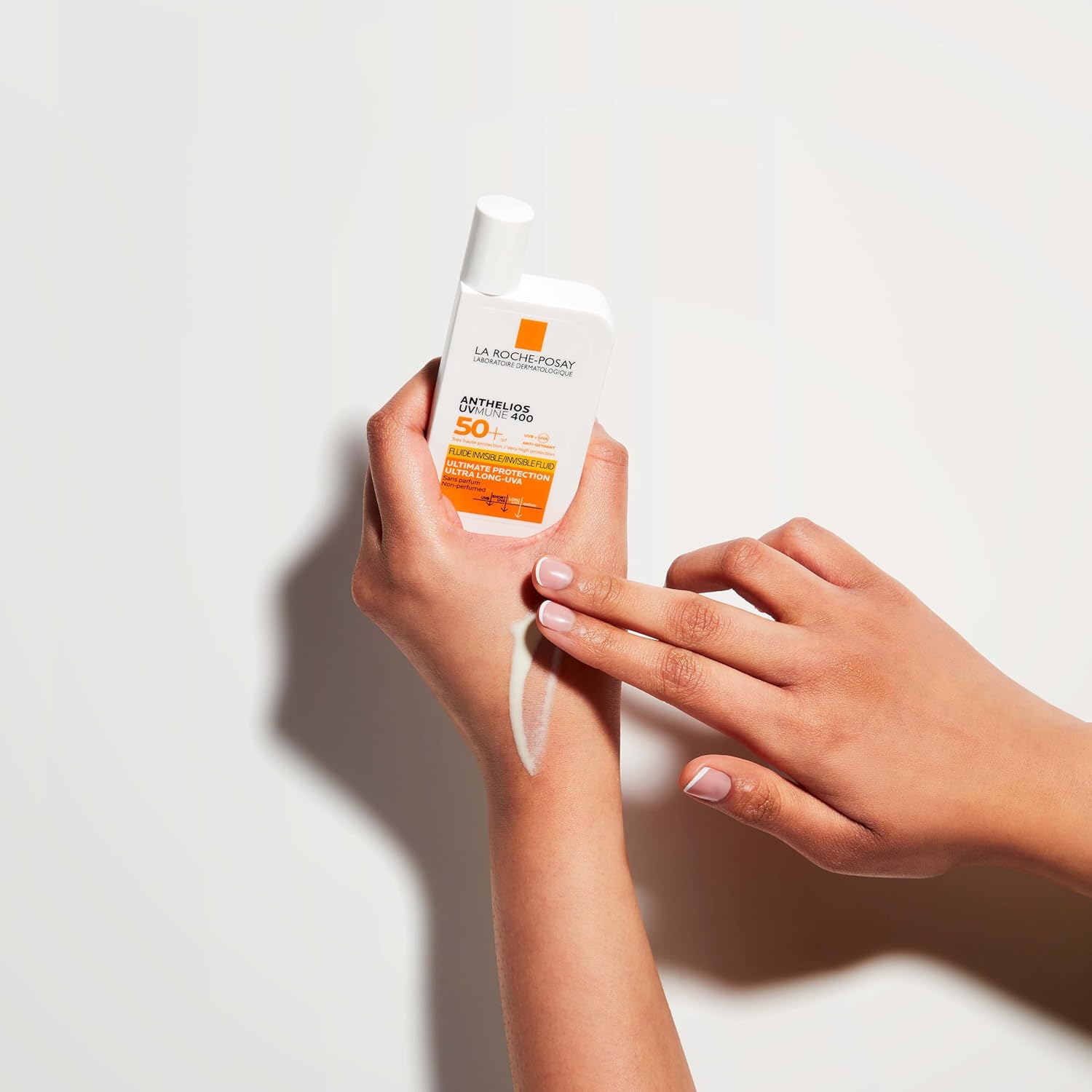 La Roche-Posay Anthelios UVmune 400 showing lightweight texture on hands