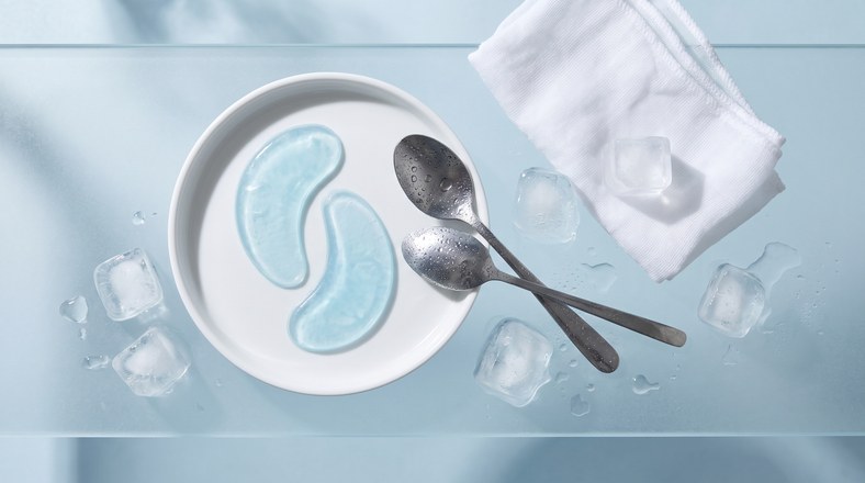 Chilled teaspoons, hydrogel under-eye patches and a cold flannel for reducing puffy eyes in the morning