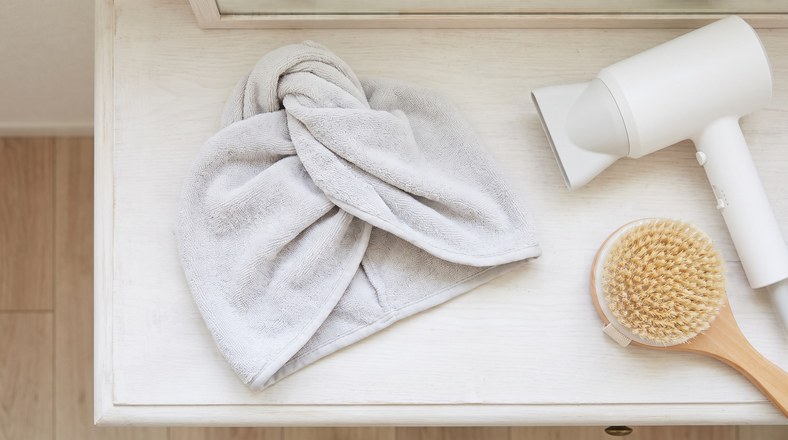 Microfibre hair towel and ionic hair dryer for gentle low-heat drying