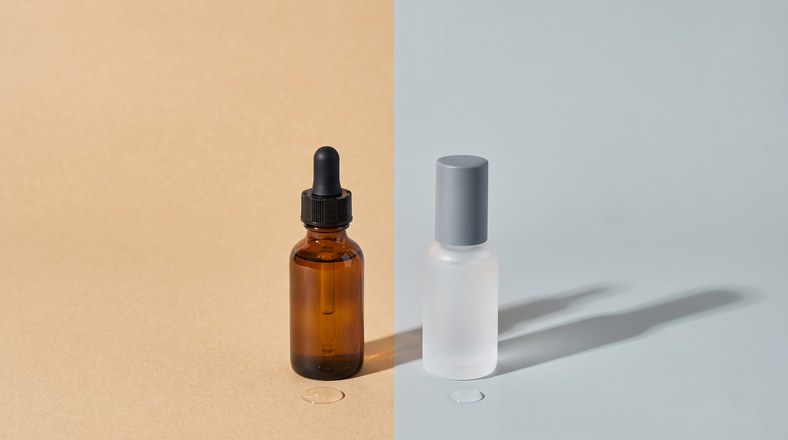 Two serums side by side representing brown and red acne marks and the different actives each needs