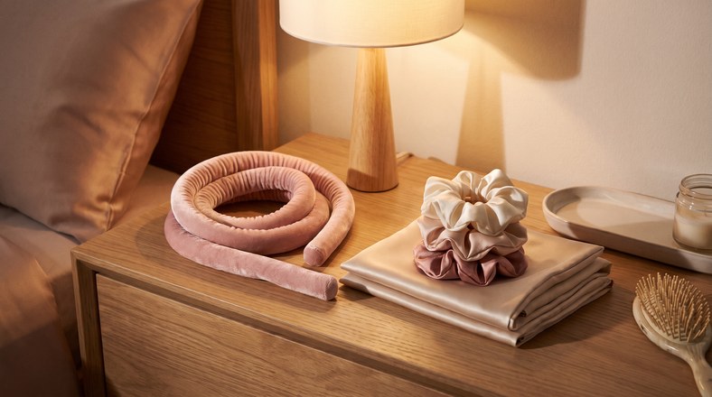 Heatless curling ribbon, satin scrunchies and silk pillowcase for styling hair without heat